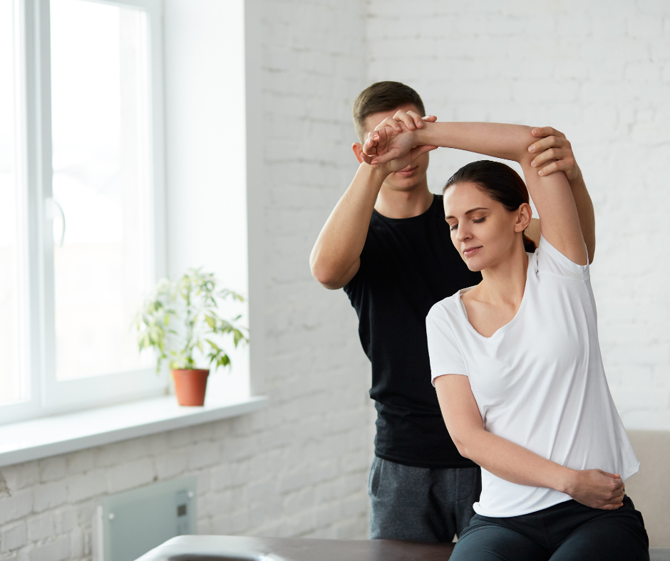 woman being stretched on massage table for active recovery